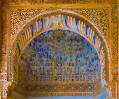 detail of a beautiful decoration of the alhambra palace in spain.