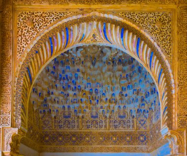 detail of a beautiful decoration of the alhambra palace in spain.