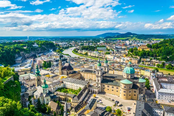 Aerial panoramic view of the historic city of Salzburg including Mirabell palace, the Salzburg cathedral and many churches
