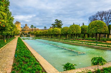 beautiful gardens of the alcazar de los reyes cristianos - royal palace of the cristian kings in the spanish city cordoba