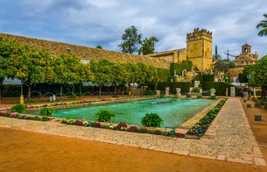 beautiful gardens of the alcazar de los reyes cristianos - royal palace of the cristian kings in the spanish city cordoba