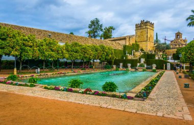 beautiful gardens of the alcazar de los reyes cristianos - royal palace of the cristian kings in the spanish city cordoba