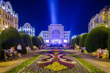 night view of the illuminated victory square - piata victoriei in romanian city timisoara - temesvar in banat province