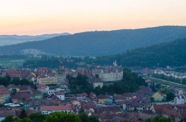 aerial view of romanian city sighisoara during sunset