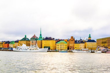 View of waterfront of Gamla Stan in Stockholm during a cloudy day