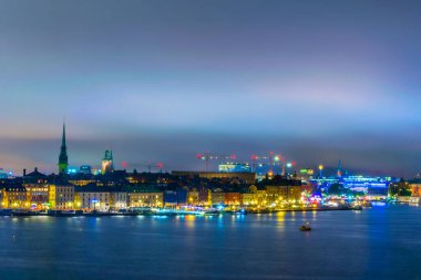 Night view of Gamla Stan dominated by Storkyrkan church