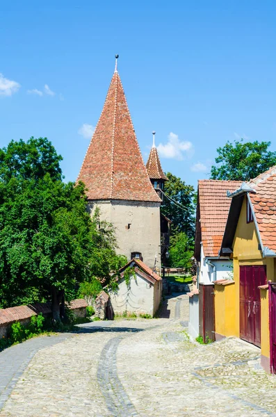 Colorful Houses Situated Winding Street Leading Next Medieval Fortification Romanian — Fotografia de Stock