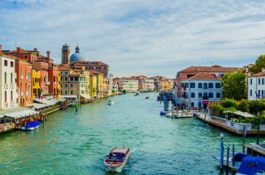 view of the grand canal in italian city venice from the ponte degli scalzi bridge