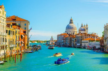 Gorgeous view of the Grand Canal and Basilica Santa Maria della Salute with interesting clouds, Venice, Italy