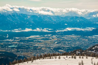 aerial view of villach from top of the gerlitzen mountain in austria.