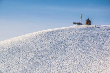 view of ski trails carved into slope of the gerlitzen mountain near villach, austria.