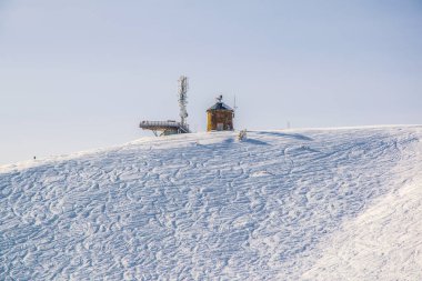 view of ski trails carved into slope of the gerlitzen mountain near villach, austria.