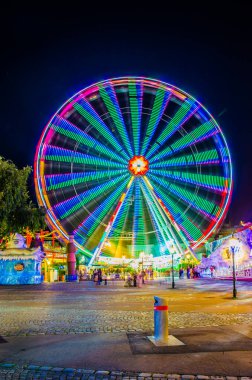 Detail of an illuminated ferris wheel in the prater amusement park in Vienna, Austria.