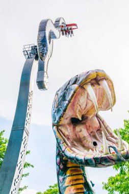 View of the black mamba attraction situated inside of the prater amusement park in Vienna, Austria.
