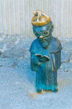 Statue of a dwarf scholar, Wroclaw, Polan