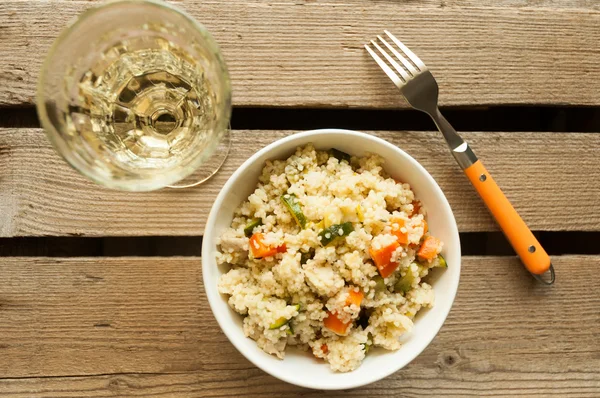 Couscous salad with chicken, zucchini and carrot — Stock Photo, Image