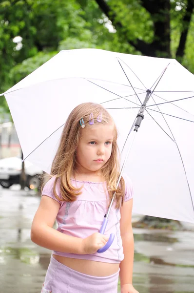 Little girl with a umbrella — Stock Photo, Image