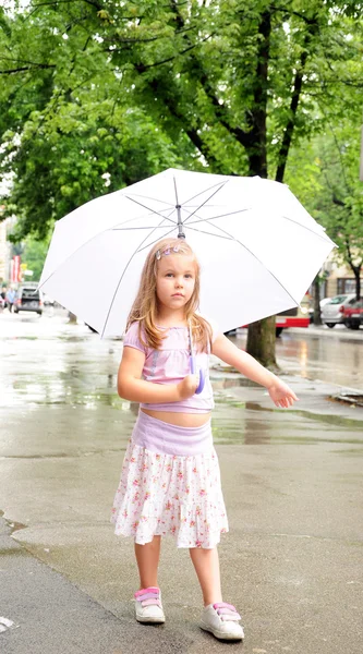 Little girl with a umbrella — Stock Photo, Image