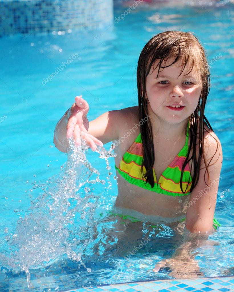Girl in the swiming pool — Stock Photo © baronb #17141481