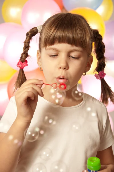 Little girl with balloons — Stock Photo, Image