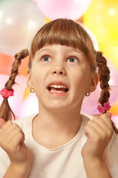 Menina feliz com balões — Fotografia de Stock