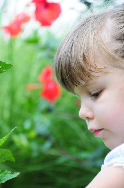 Girl with flowers — Stock Photo, Image