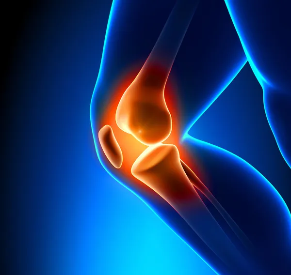 Schmerzhafte Knie-Nahaufnahme lizenzfreie Stockbilder