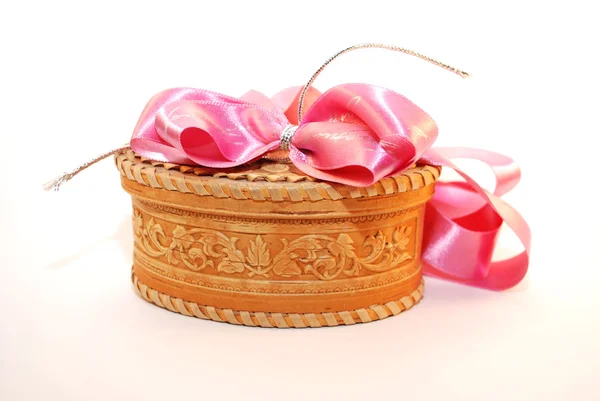 Casket with a pink bow — Stock Photo, Image