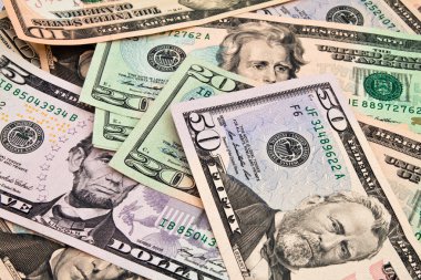 arka planını çeşitli mezheplerin dolar faturaları.