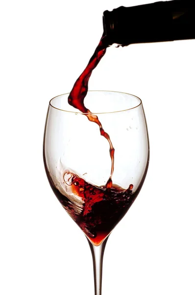Splashing wine on white background — Stock Photo, Image