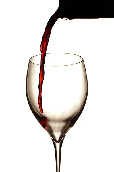 Splashing wine on white background — Stock Photo, Image