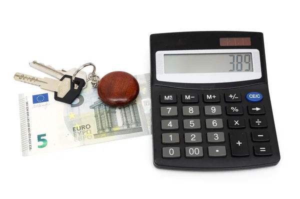 Concept of cost of living with calculator,money,keys — Stock Photo, Image