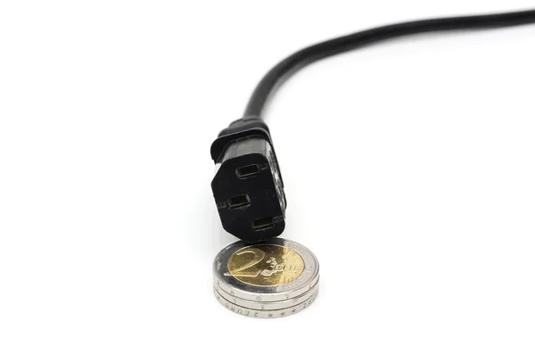 Koncepcja oszczędności komputera kabel zasilający i monety — Zdjęcie stockowe