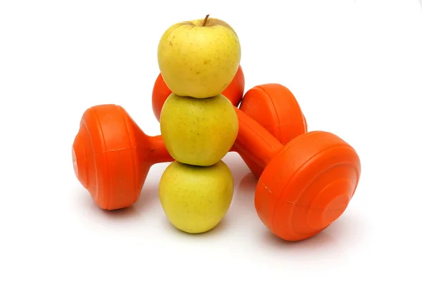 Concept of healthy life with apples and weights — Stock Photo, Image