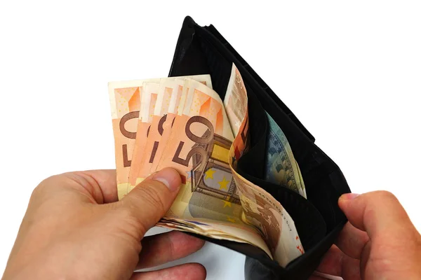 Man's hand pulling cash from the wallet — Stock Photo, Image