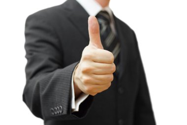 Baş parmağı havada bir iş adamı.