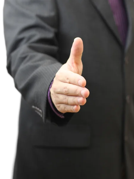 Businessman offering handshake to you — Stock Photo, Image