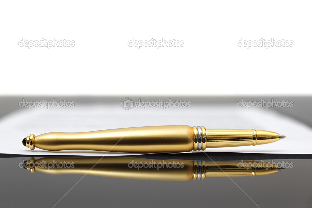 White paper with gold pen with white background