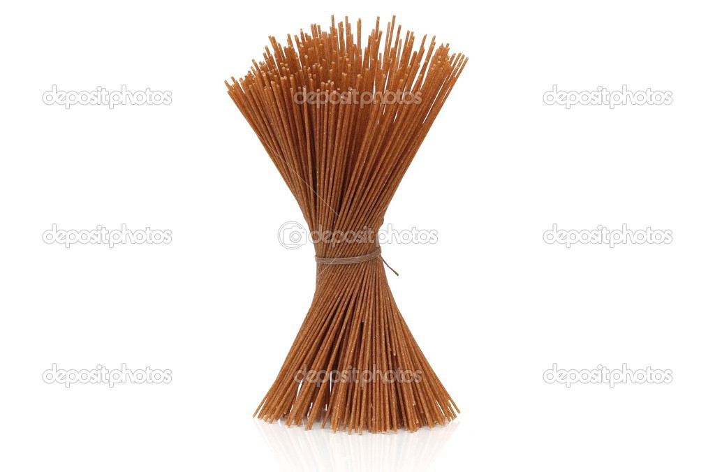 raw whole grain spaghetti tied
