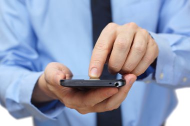 Akıllı cep telefonu kullanan bir işadamı