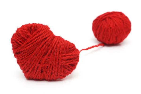 Yarn of wool in heart shape symbol — Stock Photo, Image