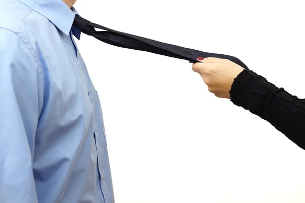 Oficina amor romance concepto con mujer tirando de corbata — Foto de Stock