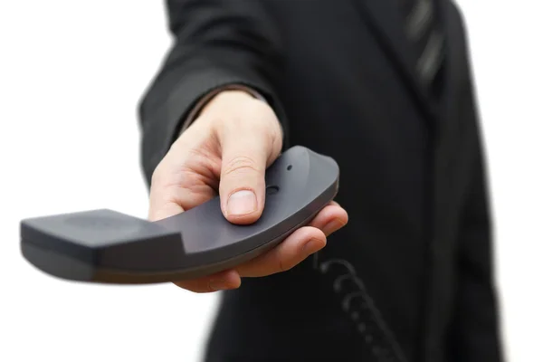 Hombre de negocios está ofreciendo teléfono — Foto de Stock