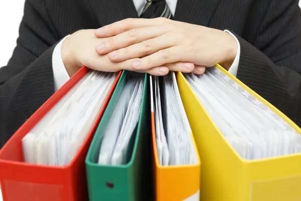 Midsection of businessman with binders at office — Stock Photo, Image