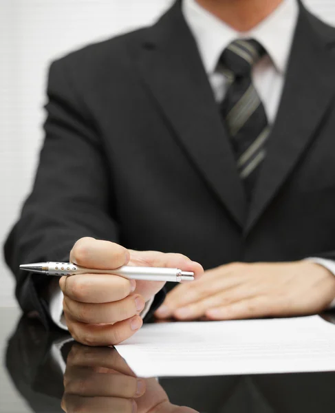 Businessman reading report — Stock Photo, Image