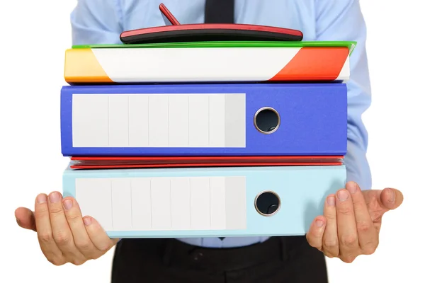 Businessman carrying binders — Stock Photo, Image