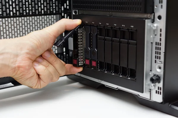 Inserting disk into data server — Stock Photo, Image