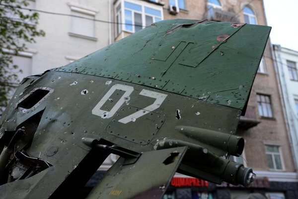 KYIV, UKRAINE - MAY 02, 2022: A fragment of the tail of a Russian military aircraft SU-25, which was destroyed by the Ukrainian military in the Kiev region. Russia invaded Ukraine on February 24, 2022