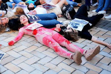 KYIV, UKRAINE - 2022/08/04: People lie on the floor during an action in support of the soldiers of the Azov battalion, who were tortured by the Russian military on July 29, 2022 in the concentration camp in Olenivka, in the occupied territory of Ukra
