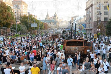 People inspect the destroyed equipment of the Russian army displayed at Khreshchatyk in the center of Kyiv. Ukrainians will celebrate the 31st anniversary of Independence Day on August 24, 2022. Russia invaded Ukraine on February 24, 2022, triggering